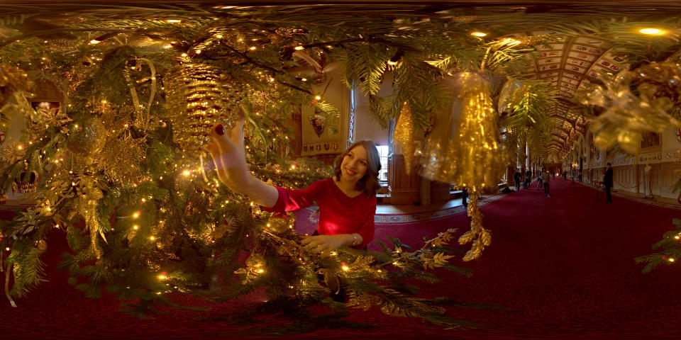 (360 image) A member of the Royal Collection hangs a decoration on a 20ft Nordmann Fir tree from Windsor Great Park in the St George's Hall on November 23, 2017 in Windsor, England.