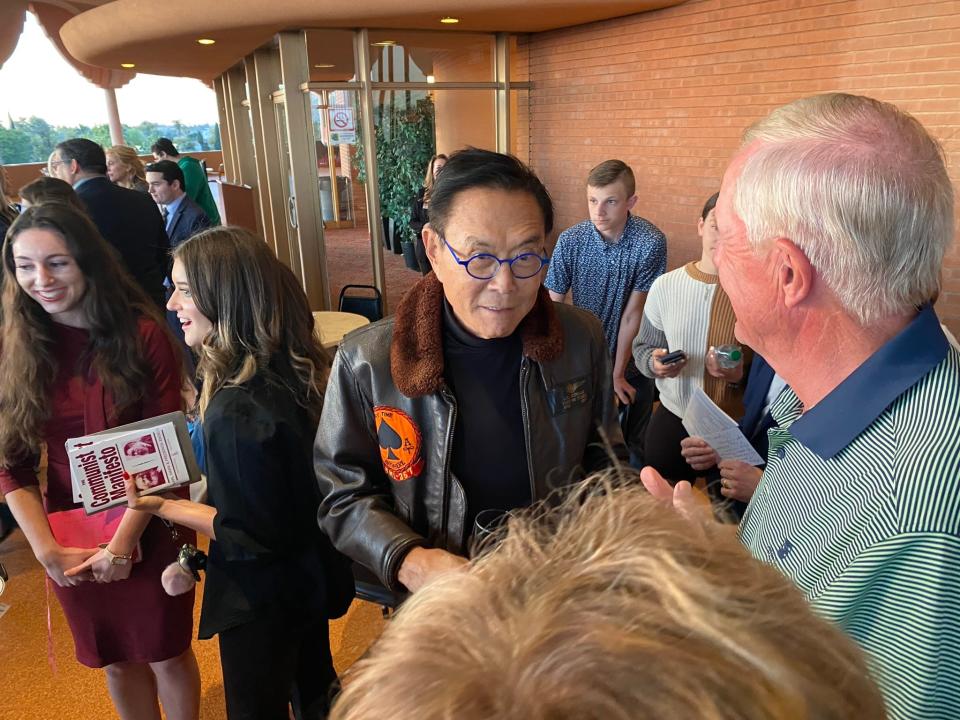 Robert Kiyosaki, author of "Rich Dad Poor Dad," meets with VIPs ahead of a program at Gammage Auditorium on Feb. 8, 2023.