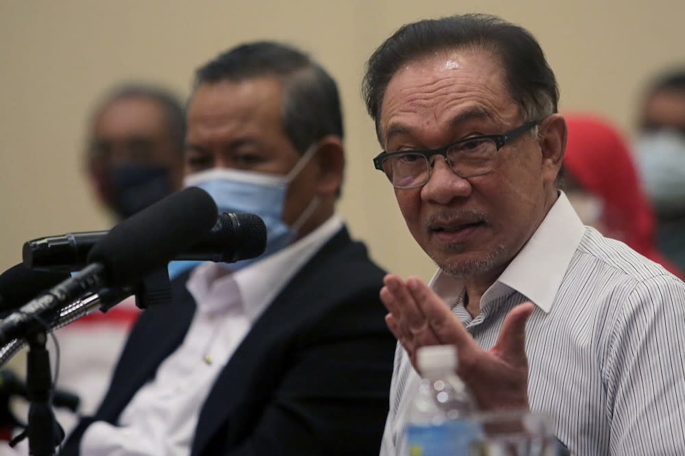 PKR president Datuk Seri Anwar Ibrahim speaks to the media as PKR welcomed 15 individuals with an Islamic background, Port Dickson April 12, 2021. — Bernama pic