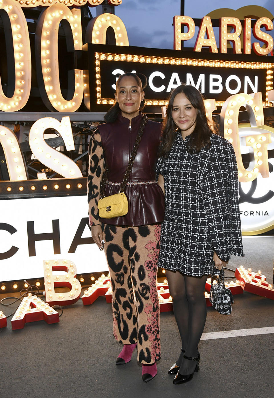 (L-R) Tracee Ellis Ross and Rashida Jones attend the CHANEL Cruise 2023/24 Show on May 09, 2023 in Los Angeles, California.