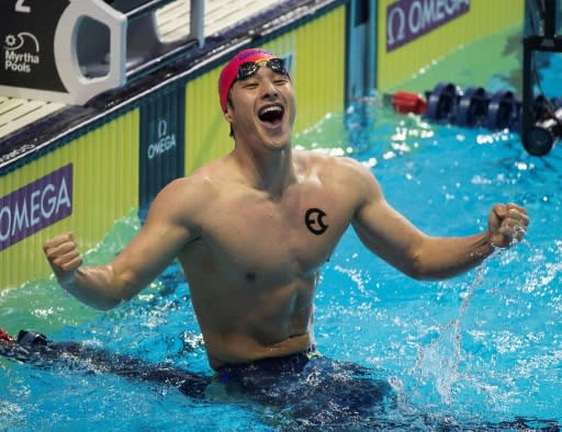 Japan's Daiya Seto swimming for the Energy Standard team celebrates his International Swimming League 400m medley victory in a short course world record