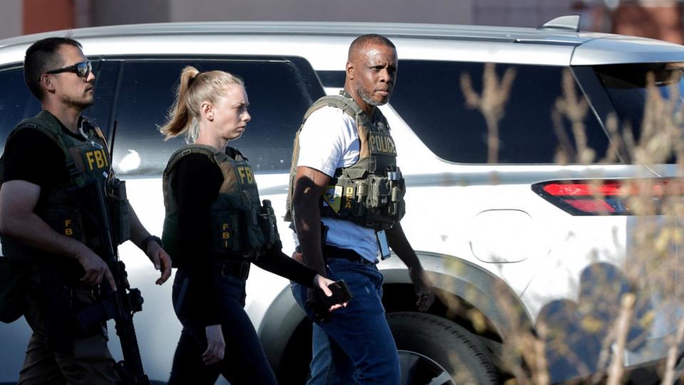 PHOTO: Law enforcement officers walk on the UNLV campus after reports of an active shooter, Dec. 6, 2023, in Las Vegas.  (Steve Marcus/Las Vegas Sun via Reuters)