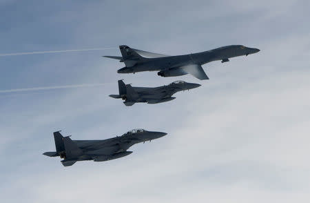 U.S. B-1B Lancer flies over South Korea during a joint live-fire drill in this handout picture provided by South Korean Air Force and relased by Yonhap on July 8, 2017. South Korean Air Force/Yonhap via REUTERS