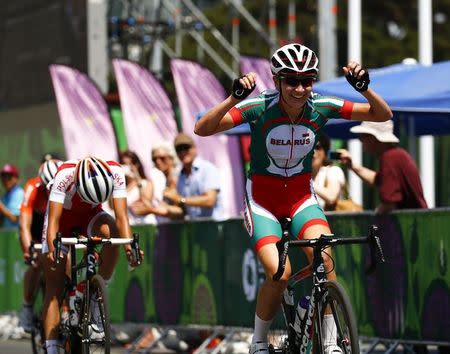 Alena Amialiusik of Belarus celebrates after winning the women's cycling road race at the 1st European Games in Baku, Azerbaijan, June 20 , 2015. REUTERS/Stoyan Nenov
