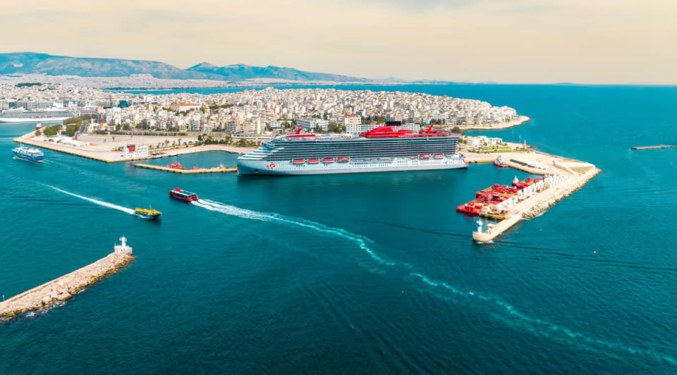 At 17 decks tall and over 900 feet long, Virgin Voyages new flagship liner, The Resilient Lady, can even make Athens look kind of small. <p>Courtesy Image</p>