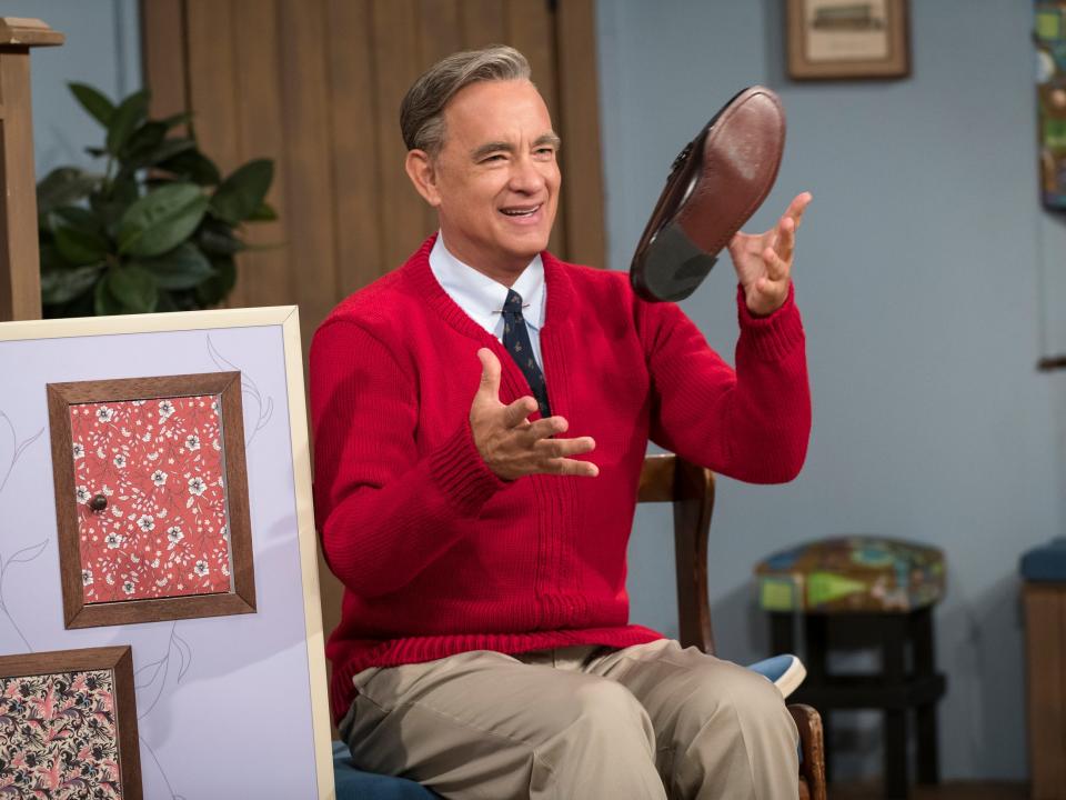 This image released by Sony Pictures shows Tom Hanks as Mister Rogers in a scene from "A Beautiful Day In the Neighborhood," in theaters on Nov. 22. (Lacey Terrell/Sony-Tristar Pictures via AP)