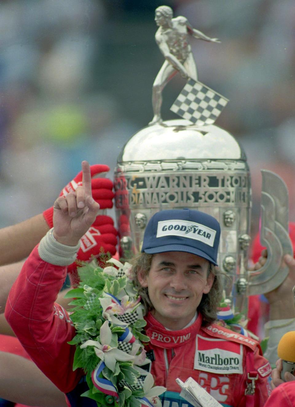 Arie Luyendyk poses in victory lane after the 1990 Indianapolis 500, the first of two he won.