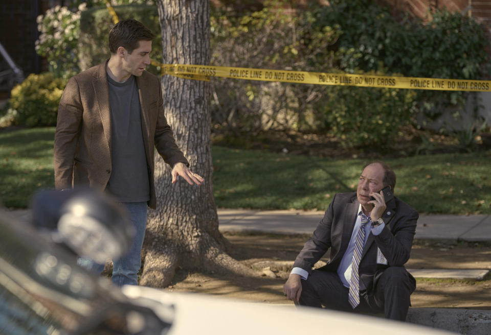 This image released by Apple TV+ shows Jake Gyllenhaal, left, and Bill Camp in a scene from the series "Presumed Innocent." (Apple TV+ via AP)