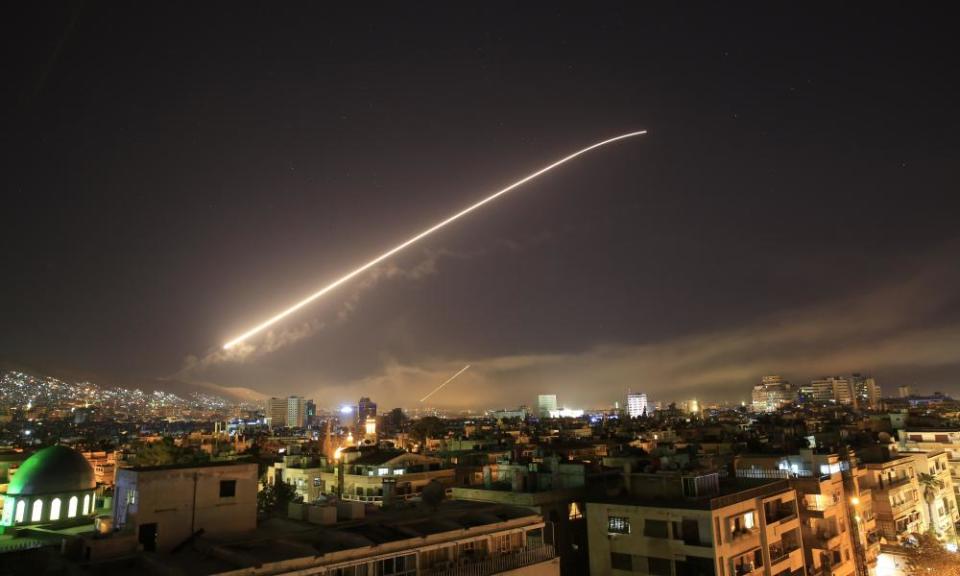 The Damascus sky lights up with missile fire as the US launches an attack on Syria.