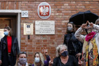 Women stage a protest against the tightening of Poland’s already restrictive abortion law, in front of the Polish Embassy in Rome, Wednesday, Oct. 28, 2020. Poland’s constitutional court declared that aborting fetuses with congenital defects is unconstitutional. Poland already had one of Europe’s most restrictive abortion laws, and the ruling will result in a near-complete ban on abortion. (Cecilia Fabiano/LaPresse via AP)