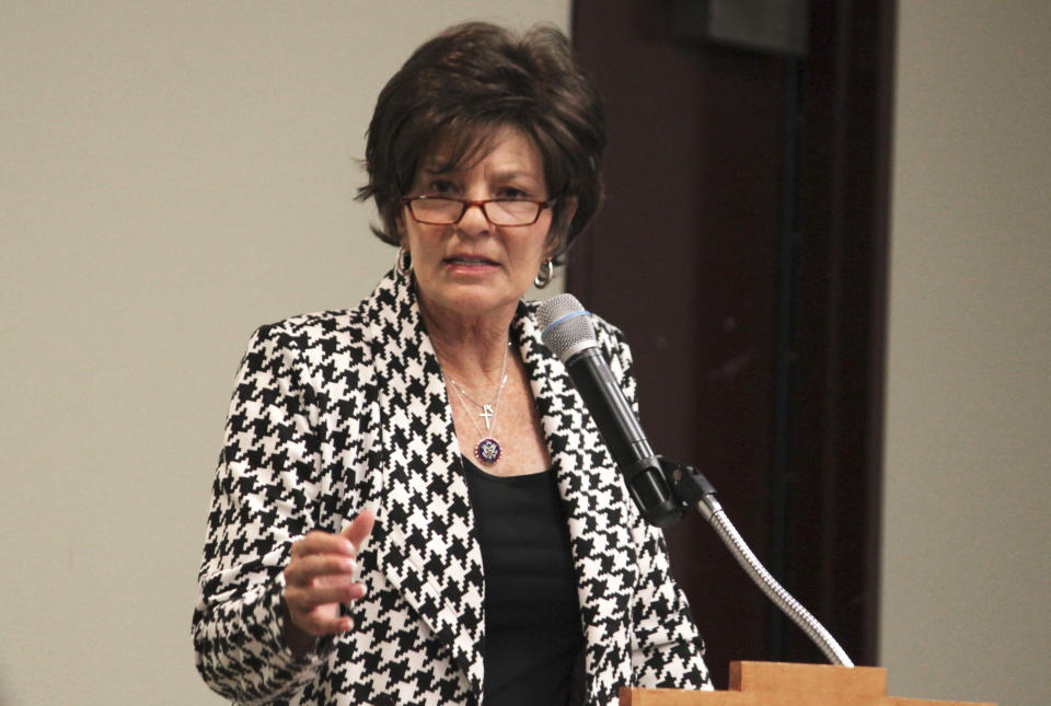 FILE - Rep. Yvette Herrell speaks to a group of tribal officials during a political forum hosted by the All Pueblo Council of Governors, Oct. 14, 2022, in Albuquerque, N.M. The New Mexico Supreme Court upheld a Democratic-drawn congressional map that divvied up a conservative, oil-producing region and reshaped a swing district along the U.S. border with Mexico, in an order published Monday, Nov. 27. The Republican Party argued unsuccessfully that the new district boundaries would entrench Democratic officials in power, highlighting the 2022 defeat of incumbent Herrell by Democratic U.S. Rep. Gabe Vasquez. (AP Photo/Susan Montoya Bryan, File)