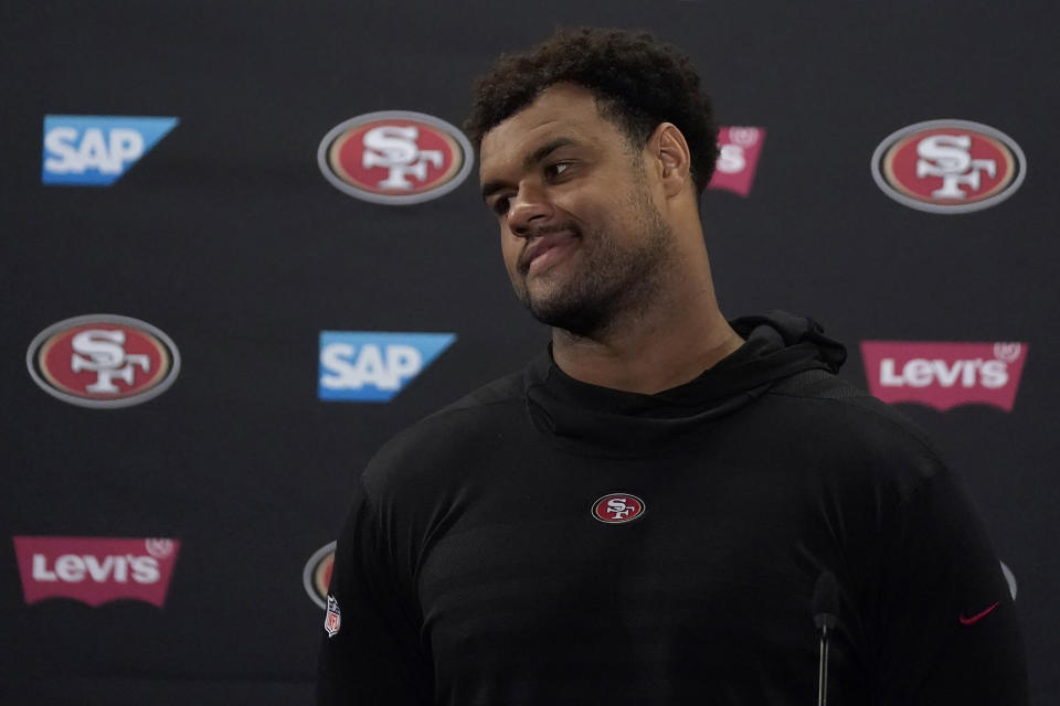 San Francisco 49ers' Arik Armstead speaks to reporters during the NFL team's football training camp in Santa Clara, Calif., Monday, July 31, 2023. (AP Photo/Jeff Chiu)