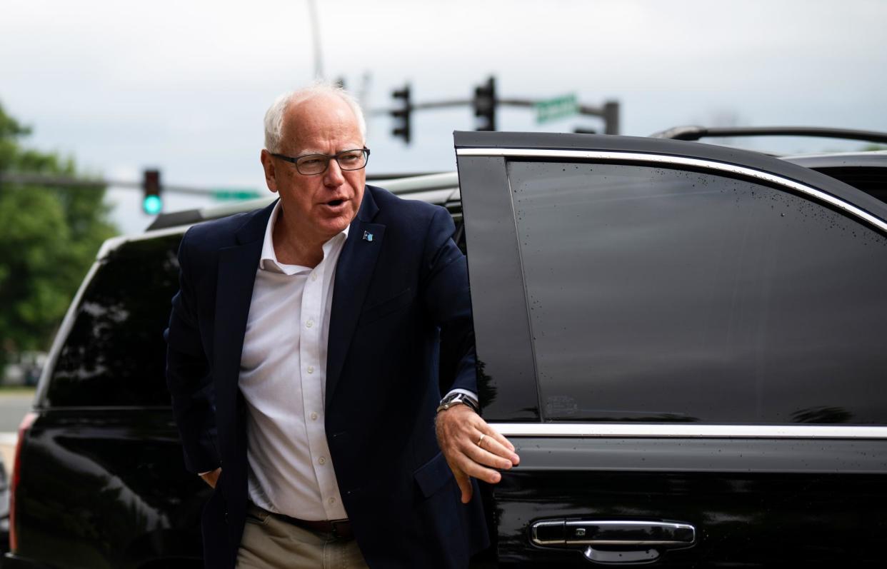 <span>Tim Walz arrives for a news conference in Bloomington, Minnesota, on Friday.</span><span>Photograph: Stephen Maturen/Getty Images</span>