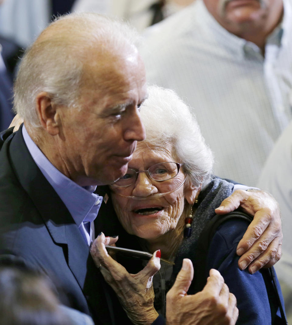 Biden hugs Sally Steffen during a campaign stop on Sept. 18, 2012, in Ottumwa, Iowa. (Photo: Charlie Neibergall/AP)