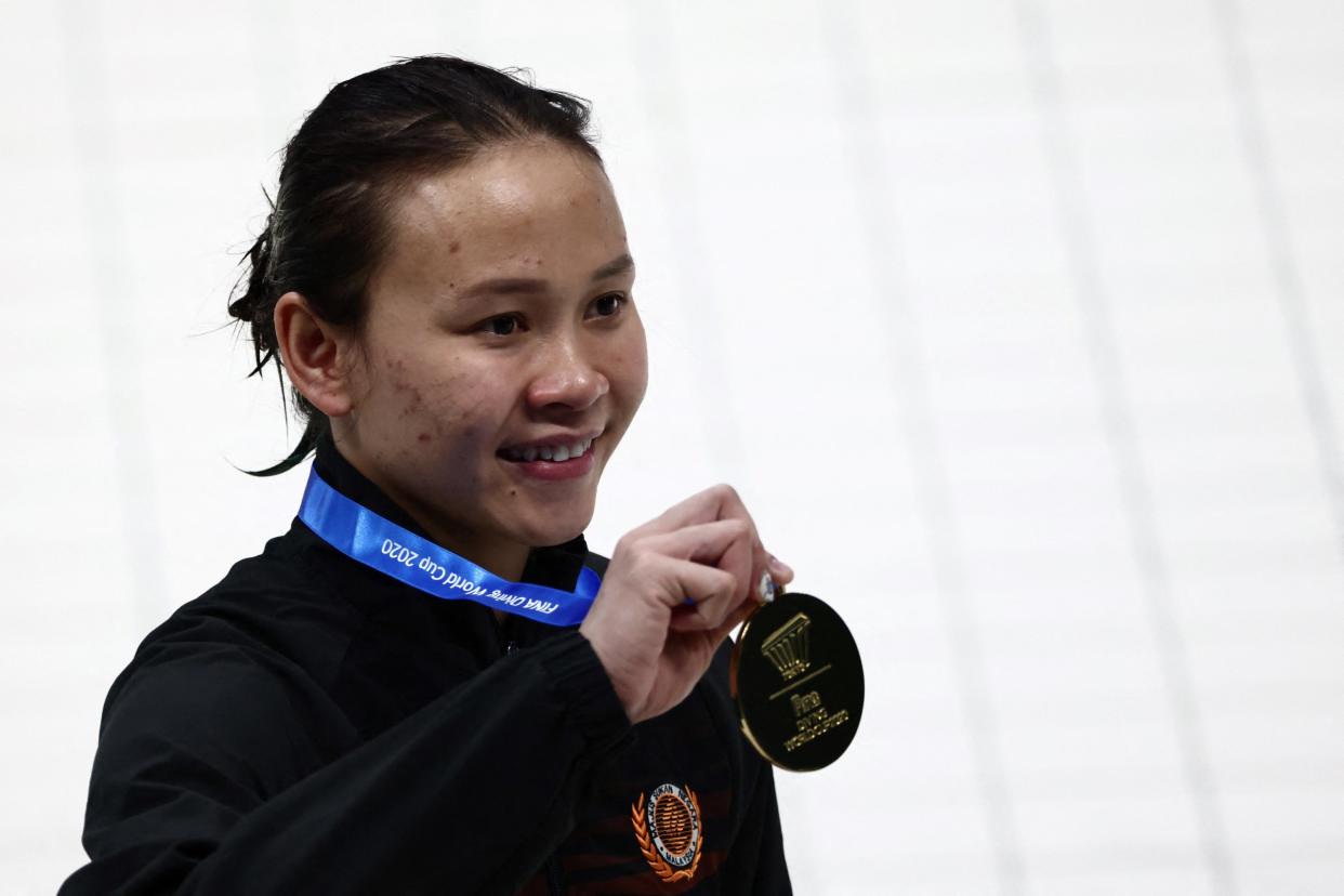 Pandelela shows her gold medal after the women’s 10m platform final at the Fina Diving World Cup and test event for the Tokyo 2020 Olympic Games, at the Tokyo Aquatics Centre May 5, 2021. ― AFP pic