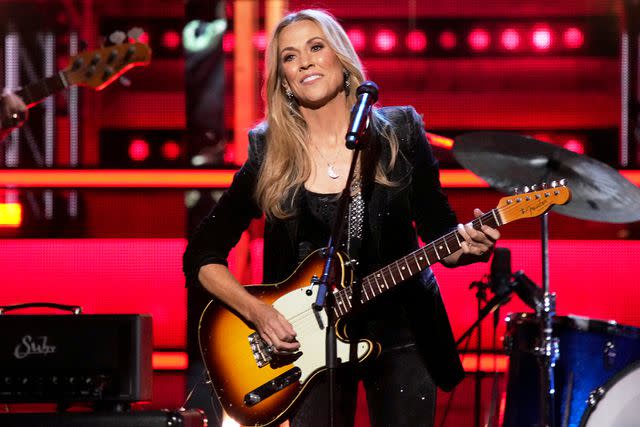 <p>Jeff Kravitz/FilmMagic</p> Sheryl Crow performs in New York City in November 2023