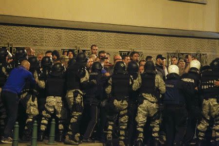 Macedonian riot police block the road near the parliament in Skopje. Macedonia April 27, 2017. REUTERS/Ognen Teofilovski