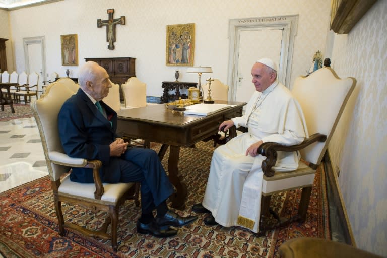 Picture released by the Vatican press office shows Pope Francis during a meeting with Former Israeli president Shimon Peres on June 20, 2016 at the Vatican