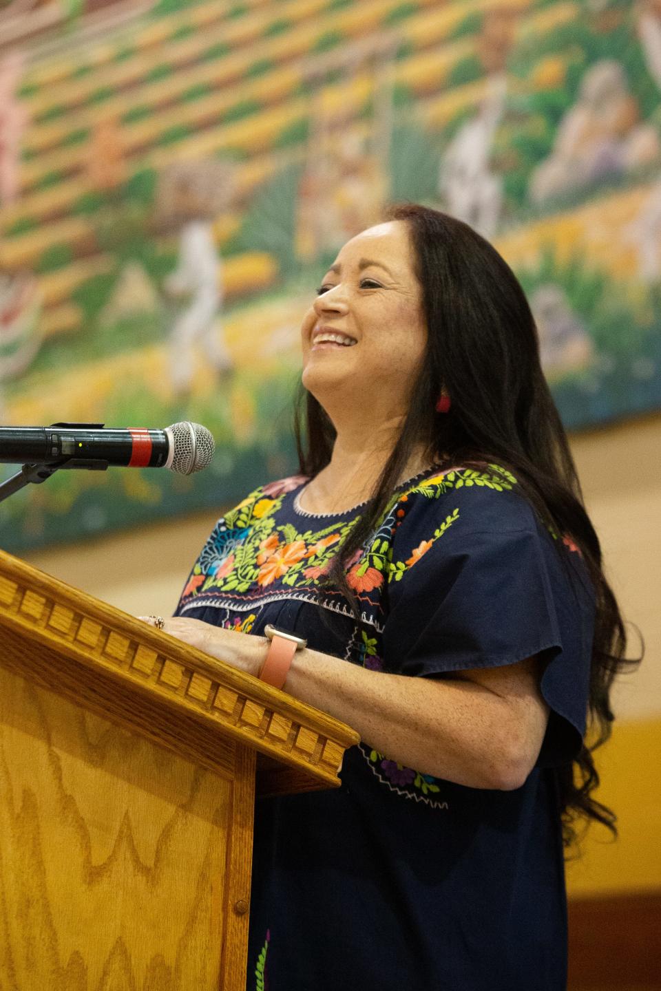 Deborah Ortega, chair of the Fiesta Topeka Committee, speaks at Wednesday's news conference to share information about added events and dates to celebrate 90 years of the Fiesta.