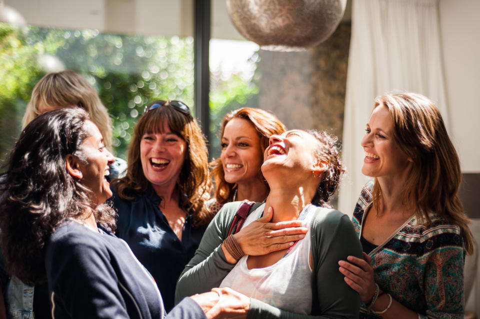 Female friends laughing