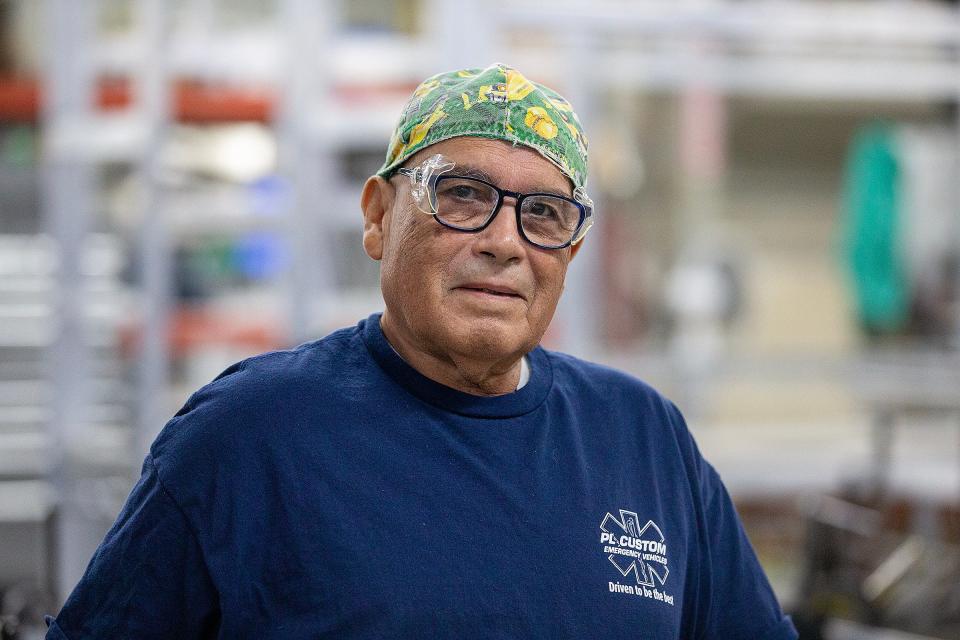 Mike Borrero, a welder who is celebrating 50 years of employment at P L Custom Emergency Vehicles, talks about his experiences as he works at P L Custom Emergency Vehicles in Wall, NJ Tuesday, October 10, 2023.