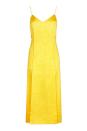 <p>This yellow slip dress is the ultimate nod to the 90s – and a great transitional piece. </p>