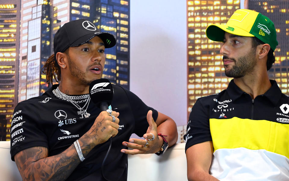 Lewis Hamilton and Daniel Ricciardo speak to the media. 