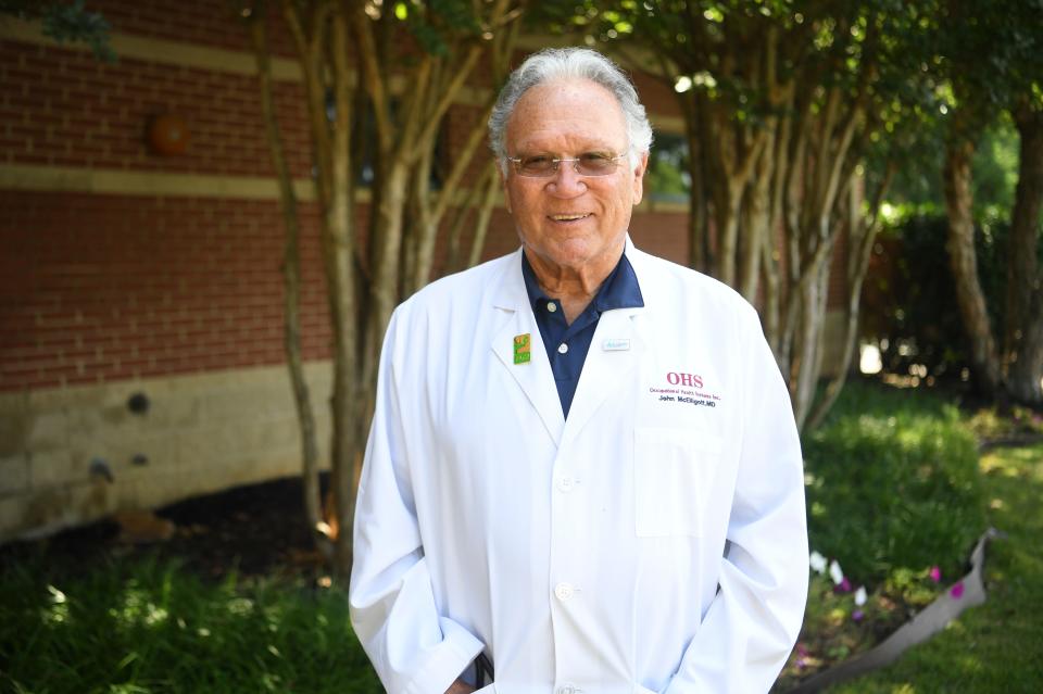 Dr. John McElligott poses for a photo outside his office, Friday, July 15, 2022. McElligott is receiving the Health Care Heroes Lifetime Achievement award. 