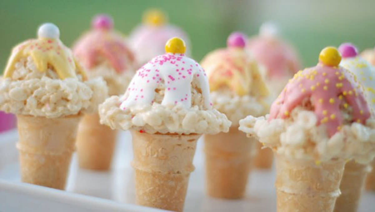 <p>Jacquilyn Avery</p><p>These mini faux ice cream cones are sure to thrill any kid, or kid at heart. Tiny cones are topped off with a scoop of crisp rice cereal and marshmallow, and garnished with candy.</p><p><strong>Get the Recipe: <a href="/27520/ashley/rice-cream-cones/" data-ylk="slk:Rice Krispy Ice Cream Cones;elm:context_link;itc:0;sec:content-canvas" class="link rapid-noclick-resp">Rice Krispy Ice Cream Cones </a></strong></p>