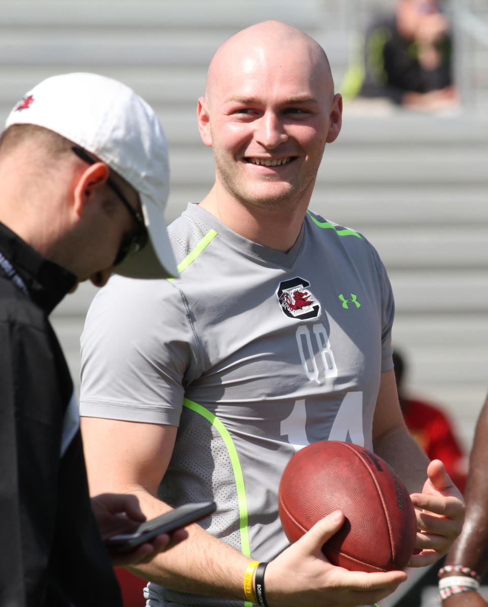 South Carolina quarterback Conner Shaw gets ready to compete in a drill for NFL representatives at South Carolina football pro day in Columbia, S.C., Wednesday, April 2, 2014. (AP Photo/Mary Ann Chastain)