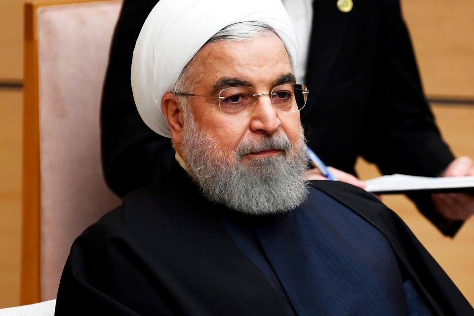 FILE - In this Dec. 20, 2019, file photo, Iranian President Hassan Rouhani attends a meeting with Japanese Prime Minister Shinzo Abe during a meeting at the prime minister's office in Tokyo.  Iran on Saturday, Jan. 11, 2020, acknowledged that its armed forces “unintentionally” shot down the Ukrainian jetliner that crashed earlier this week, killing all 176 aboard, after the government had repeatedly denied Western accusations that it was responsible. (Charly Triballeau/Pool Photo via AP, File)