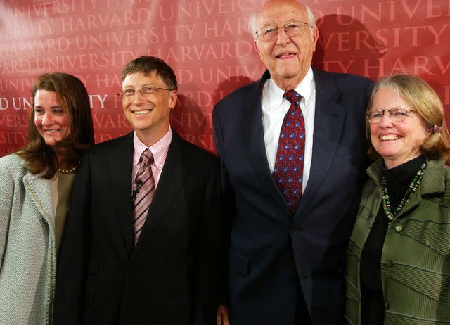 <p>Darren McCollester/Getty</p> Melinda Gates, Bill Gates, Bill Gates Sr. and Mimi Gardner at Harvard University on June 7, 2007.