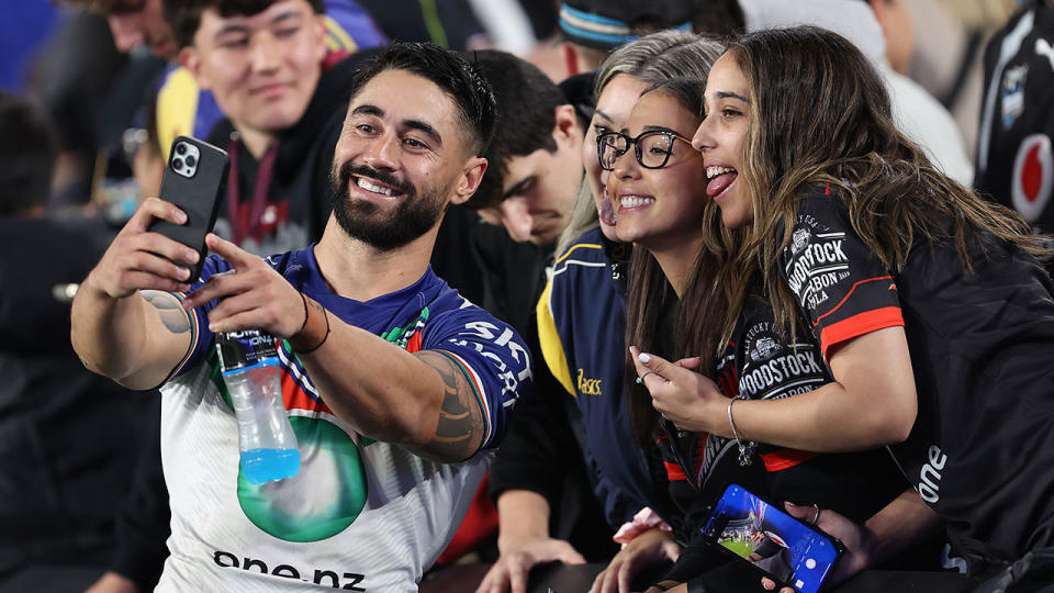 Seen here, Shaun Johnson poses with fans after the Warriors' victory over Canterbury in the NRL. 