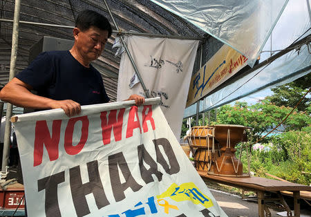 Lee Jong-hee, a 61-year-old farmer, attends an anti-THAAD protest in Seongju, South Korea, July 4, 2018. REUTERS/Kim Jeong-min