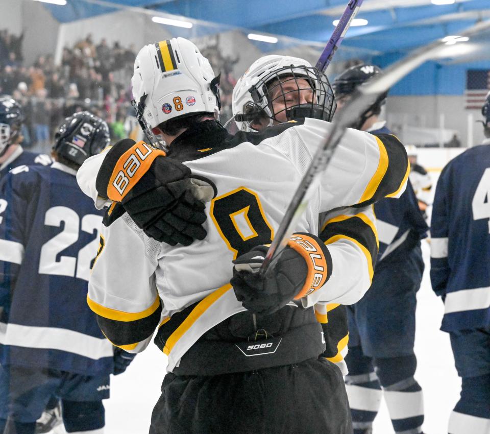 Sam Mayhew and Colin Ward (8) after putting Nauset up 4-2 against Nantucket.