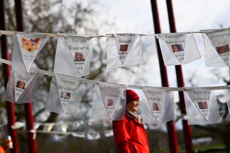 Photographs are displayed by The Women's Institute (WI) showing the 125 women killed by men in the UK, at Clapham Common in London