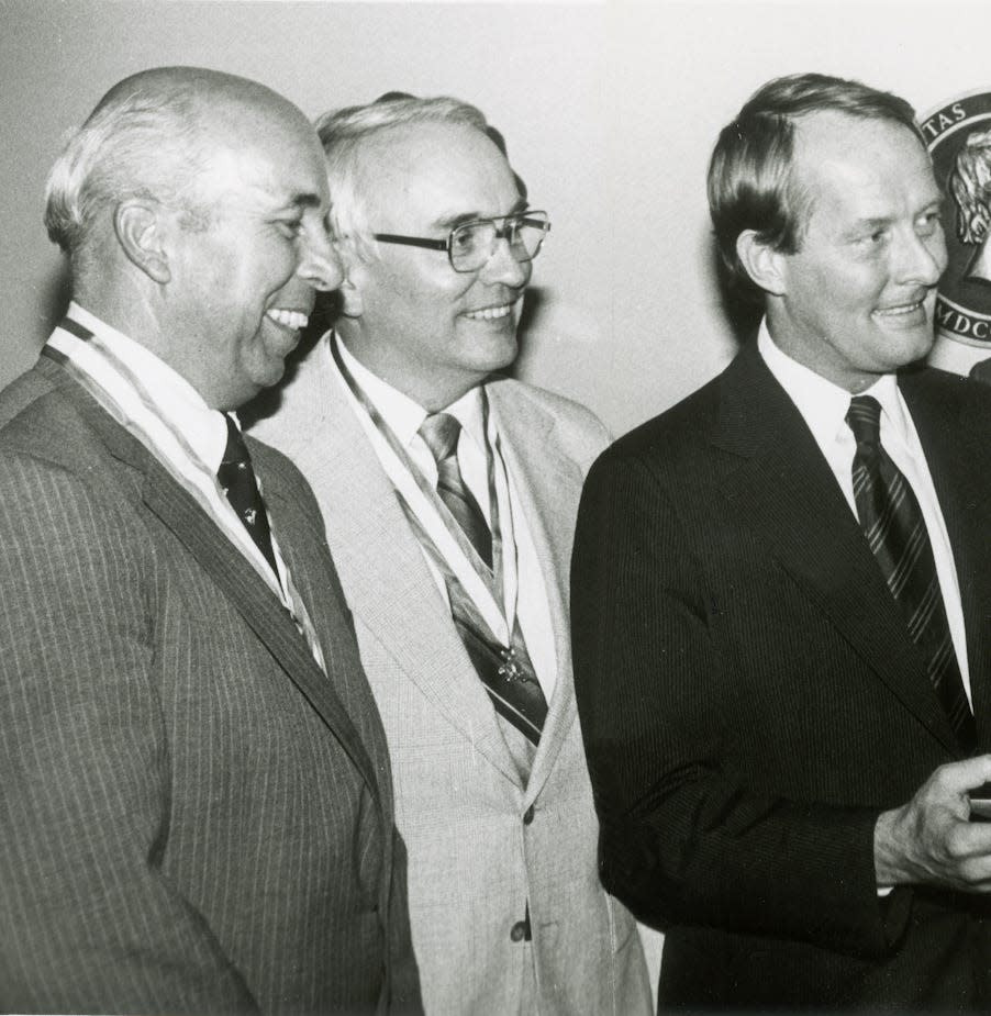 ALCOA President Richard Ray, left, C.D. Martin and Gov. Lamar Alexander attend the Boy Scouts' Silver Beaver Awards ceremony on March 27, 1980. Ray, a Great Smoky Mountains Council executive board member, and Martin, chairman of the Pellissippi District, were presented their awards by Alexander, himself an Eagle Scout.
(Photo: News Sentinel Archive)