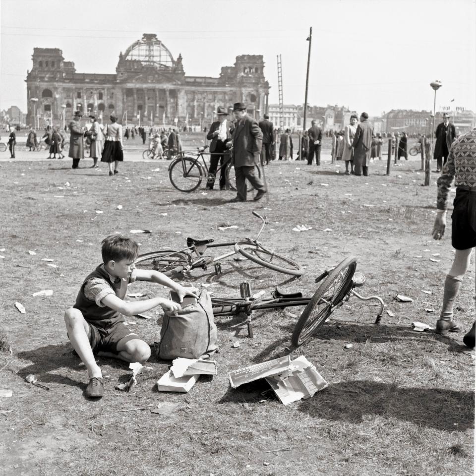 A child playing in front of the bombed-out Reichstag, 1951 - Getty Images