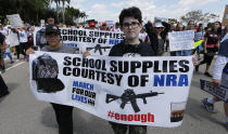 <p>People take part in a “March For Our Lives” rally in Parkland, Fla. (AP Photo/Joe Skipper) </p>