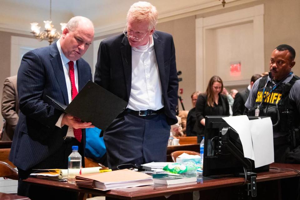 Alex Murdaugh speaks with defense attorney Jim Griffin during his trial for murder at the Colleton County Courthouse on Tuesday, Feb. 7, 2023. Joshua Boucher/The State/Pool