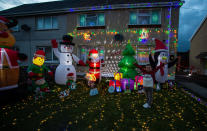 A mum has gone all out to cheer up her kids and neighbours by putting up her CHRISTMAS decorations three months early - including 3,000 outdoor lights. Caroline Gabe, 46, has been shielding with her children since March - and said putting up her tree and decorations in September was a much-needed boost. She has spent the year buying outdoor lights and installations - from as far away as America - and put them all up last week, on a whim. Almost all of them are outside - including 3,000 fairy lights, sparkling snow, an 8ft inflatable snowman, as well as Santa and his reindeer.