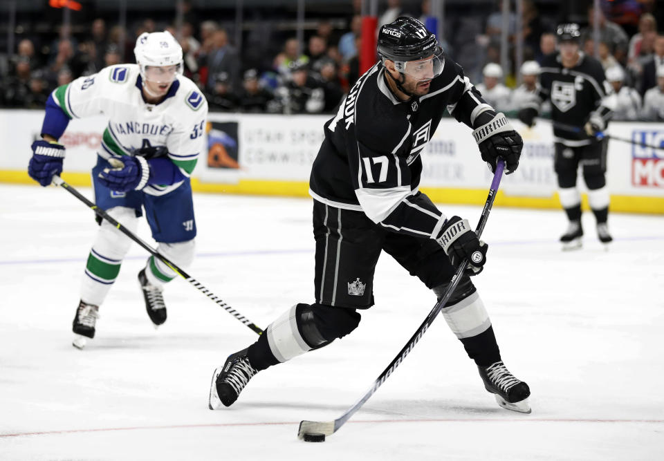 FILE - In this Monday, Sept. 24, 2018, file photo, Los Angeles Kings forward Ilya Kovalchuk (17) takes a shot in the third period if a preseason NHL hockey game against the Vancouver Canucks in Salt Lake City. Kovalchuk is back in the NHL for the first time since 2013. He is being counted on to inject more scoring to a Kings team that has lacked offensive punch in recent seasons. (AP Photo/Jeff Swinger, File)