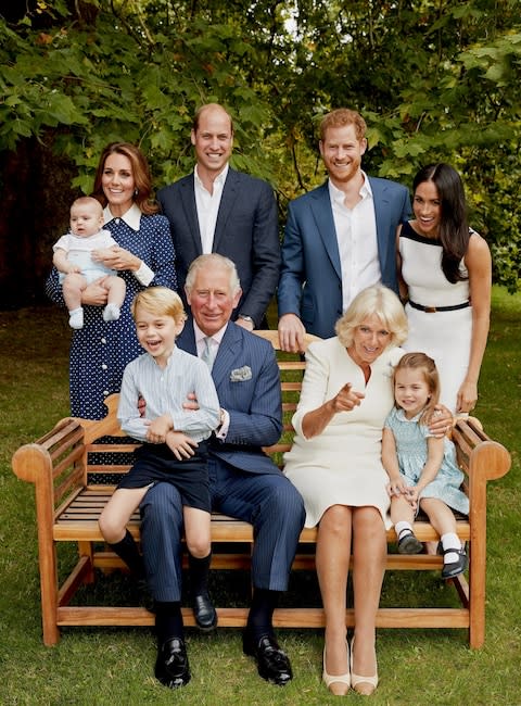 Prince Charles Prince of Wales poses for an official portrait to mark his 70th Birthday in the gardens of Clarence House, with Their Royal Highnesses Camilla Duchess of Cornwall, Prince Willliam Duke of Cambridge, Catherine Duchess of Cambridge, Prince George, Princess Charlotte, Prince Louis, Prince Harry Duke of Sussex and Meghan Duchess of Sussex - Credit: Chris Jackson / Getty 