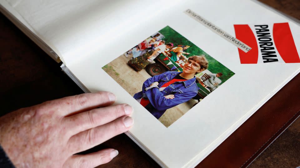 Bert Janssen looks at a photograph of himself as a younger man. - Piroschka Van De Wouw/Reuters