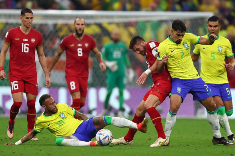 Neymar Jr. (on ground) helped Brazil win a gold medal at the 2016 Summer Games in Rio De Janeiro. File Photo by Chris Brunskill/UPI