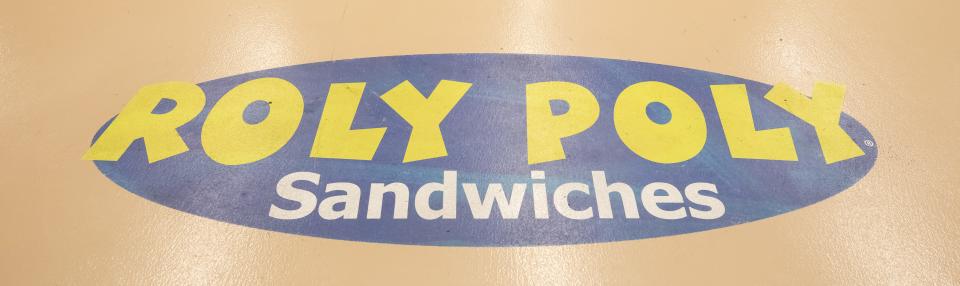 The Roly Poly Sandwiches logo is seen on the floor of the Ivy Tech Bloomington location.