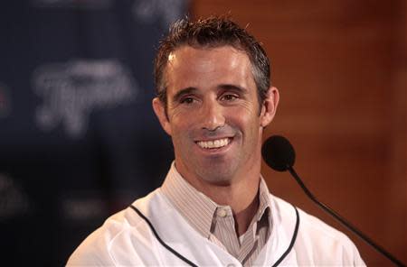 Brad Ausmus answers questions from reporters during a press conference where he was named the 37th manager in franchise history of the Detroit Tigers at Comerica Park in Detroit, Michigan November 3, 2013. REUTERS/Rebecca Cook