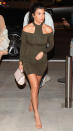 <p>Kourtney and younger sister Kim stepped out in <a rel="nofollow noopener" href="http://www.instyle.com/celebrity/kim-kardashian-kourtney-kardashian-wear-bodycon-dresses-miami" target="_blank" data-ylk="slk:#twinning skintight dresses;elm:context_link;itc:0;sec:content-canvas" class="link ">#twinning skintight dresses</a> to attend their friends’ pre-wedding festivities in Miami. Kourtney wore an olive green mini with shoulder cut-outs and ankle-strap nude heels and opted for a pulled-back hairstyle to finish off the look.</p>