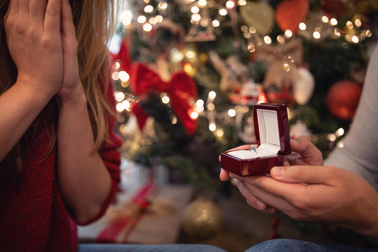 Man proposing to his wife on Christmas Eve