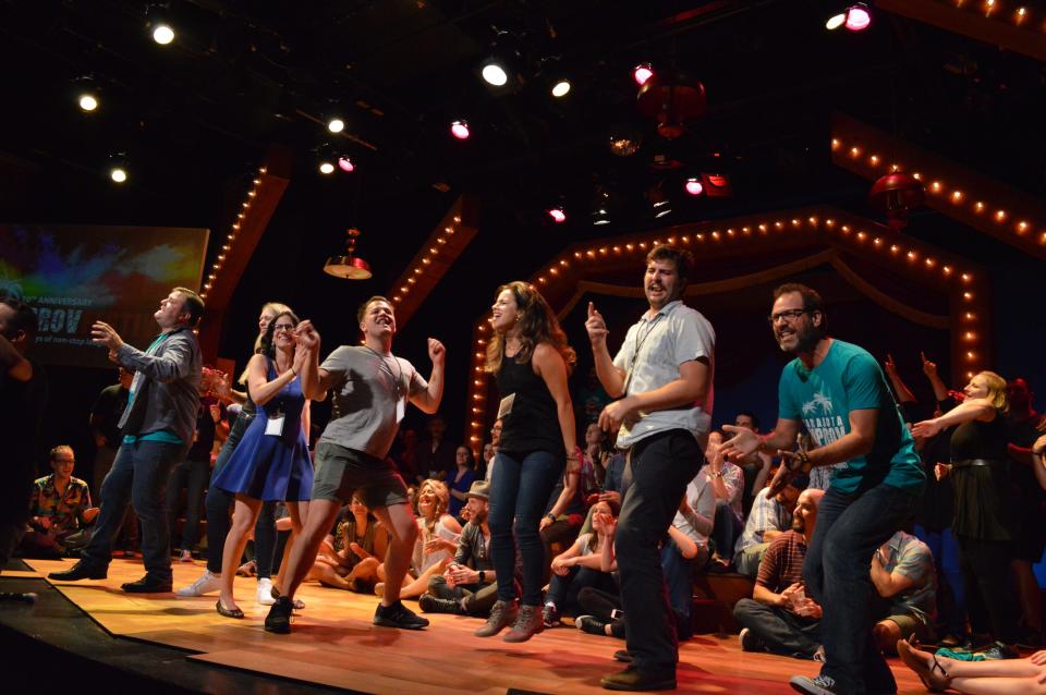 During the All-Play segment of the Sarasota Improv Festival, as seen in the 2019 festival, performers from all troupes involved in the weekend take turns playing improv games.